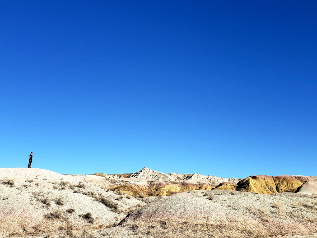 A lone person faces a heroic journey across unknown lands.